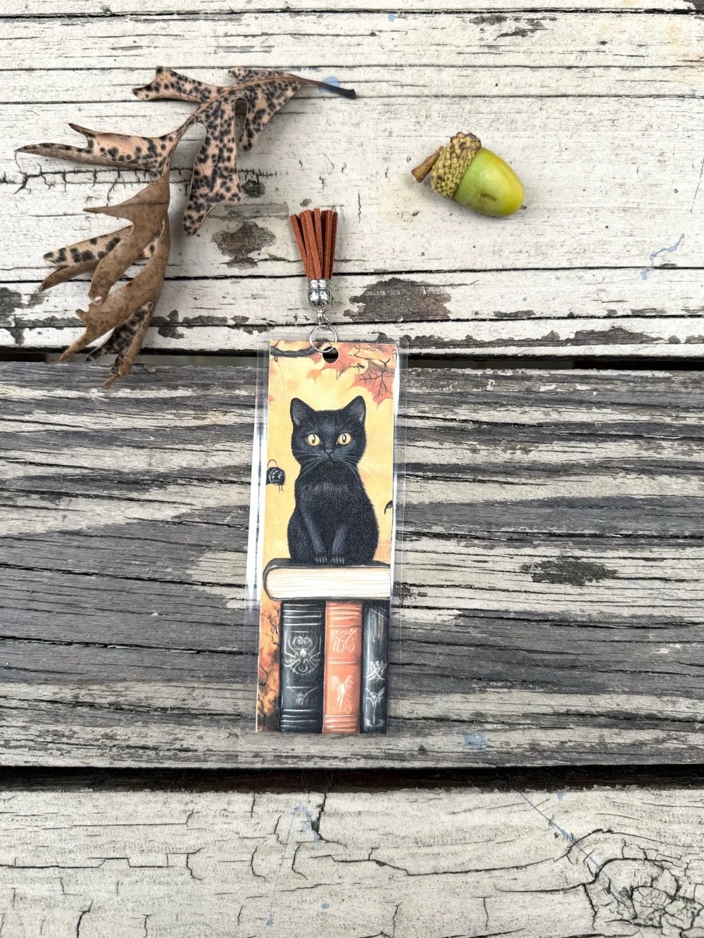 Hand Crafted double-sided laminated bookmark with faux leather tassel